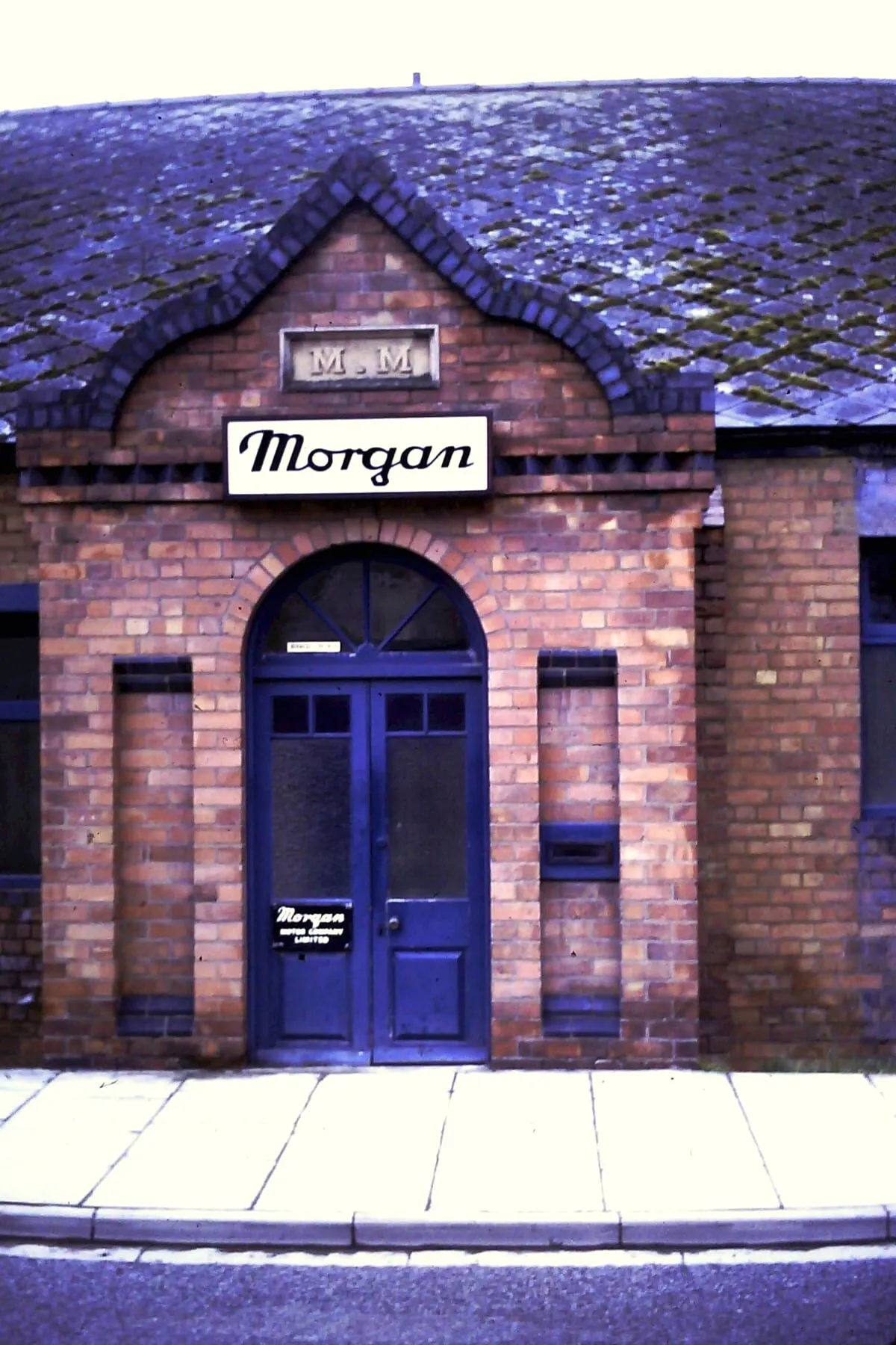 The arched entrance and Morgan sign above the factory door