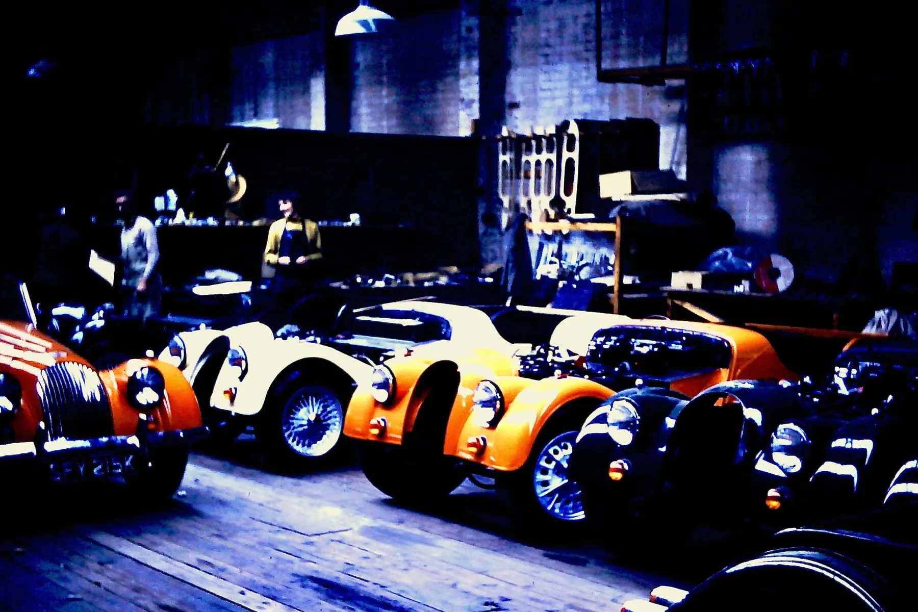 A row of partly assembled Morgans inside the works