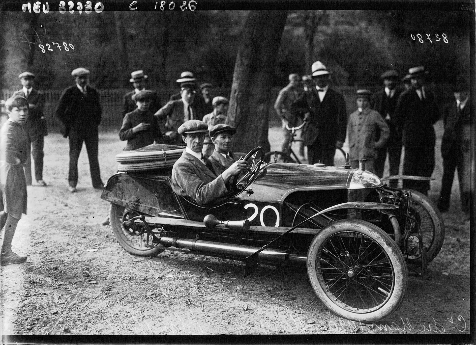 A black-and-white press photograph of a Morgan cyclecar carrying race number 20, at Le Mans in 1920